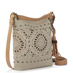The Sak Lucia Crossbody Bag in Crochet, Convertible Purse with Adjustable Shoulder Strap - color: Natural Grey Medallion